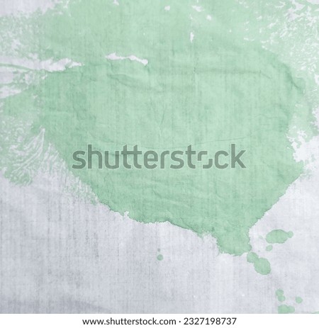 green ink grunge background image on rice paper