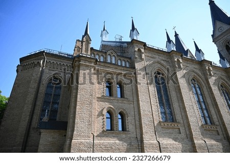 a magnificent brick neo-Gothic Catholic church