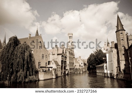 A canal with medieval buildings in the historic town of Bruges, Belgium