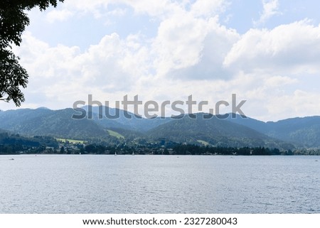 a beautiful view with mountains, a blue sky in the clouds, of a lake in Bavaria,Germany 