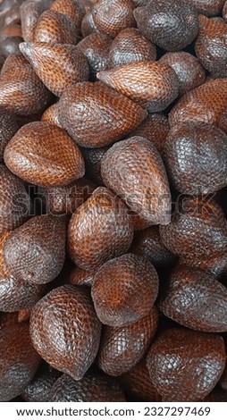 native Indonesian fruit, Snakefruit or know as "salak" a species of palm tree (family Arecaceae) native to Java and Sumatra in Indonesia. it has the pokey skin that has a similarity with snake skin.