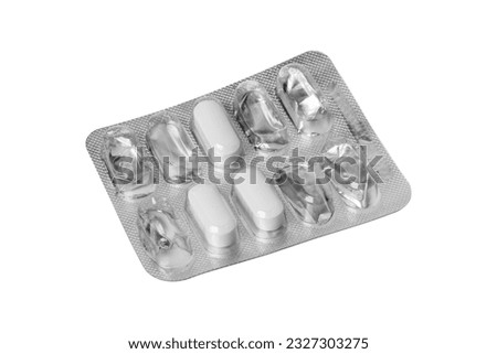 Used blister with pills on a white background. Royalty-Free Stock Photo #2327303275
