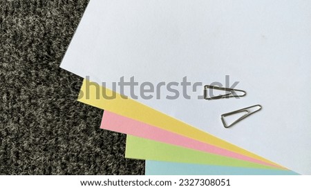 colour paper with a paper clip