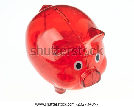 Red piggy bank on a white background.