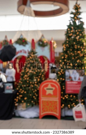 Defocused outlet mall Christmas backdrop for Santa pictures