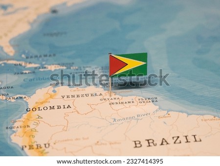The Flag of Guyana on the World Map.