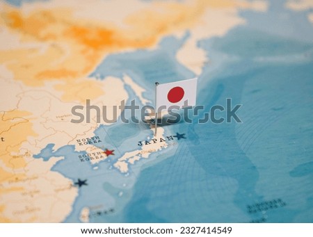 The Flag of Japan on the World Map. Royalty-Free Stock Photo #2327414549