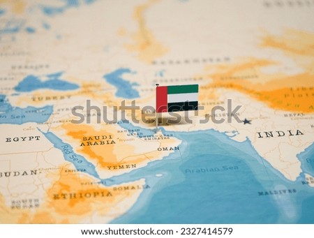 The Flag of United Arab Emirates on the World Map.