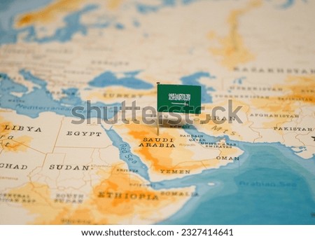 The Flag of Saudi Arabia on the World Map.
