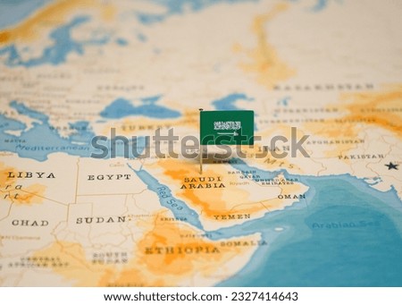 The Flag of Saudi Arabia on the World Map.