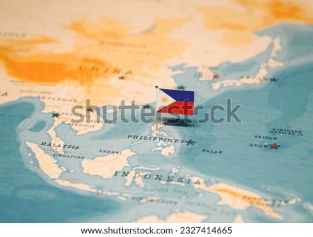 The Flag of Philippines on the World Map.