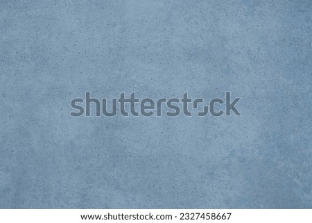 Turquoise painted concrete wall. Texture background for design.