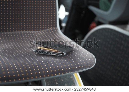  left wallet on a public bus seat 