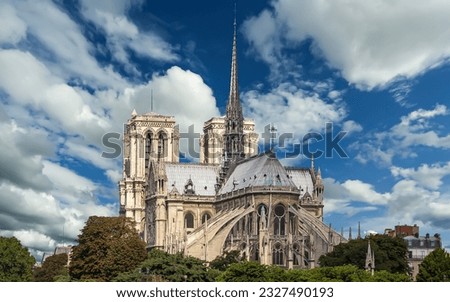 Notre Dame de Paris (against the background of sky with clouds), also known as Notre Dame Cathedral or simply Notre Dame, is a Gothic, Roman Catholic cathedral of Paris, France