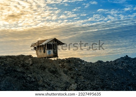 hut for field supervisor at coal mine, photographed early in the morning