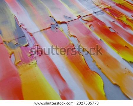 Rough abstract colorful art image with oil brushes, paints, palette knife on paper background.