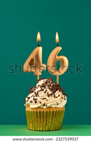 Birthday card with candle number 46 - Green background