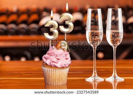 Cupcake With Number For Celebration Of Birthday Or Anniversary; Number 33.