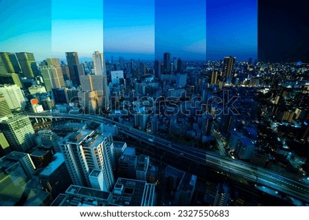 A sliced time lapse photography of panorama cityscape near the railway in Osaka wide