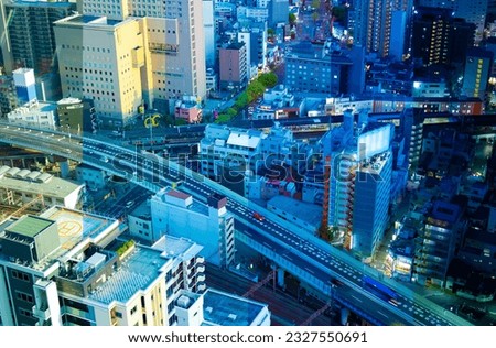 A sliced time lapse photography of panorama cityscape near the railway in Osaka