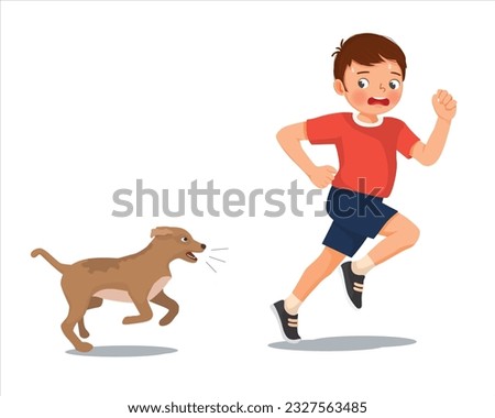 Cute little boy running scared chased by barking dog