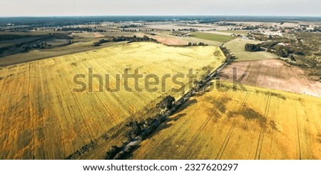 Fields and meadows, views of the Greater Poland region from above. Drone shot from above, aerial. Royalty-Free Stock Photo #2327620297