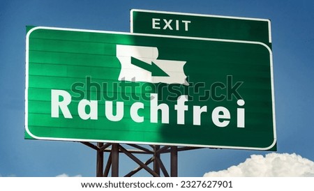 An image with a signpost in German pointing in the direction of smokeless.