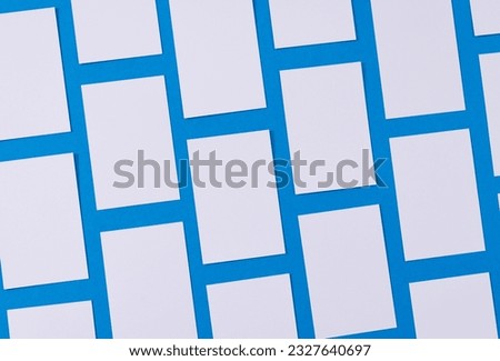 White business cards with copy space on blue background. Business, business card, stationery and writing space concept.