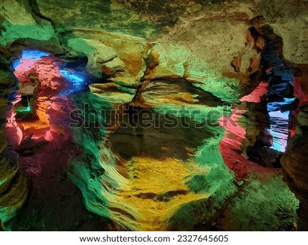 Dark Colorful Lit Rainbow Caves and Cavern Paths