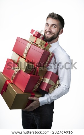 Attractive man with many present boxes