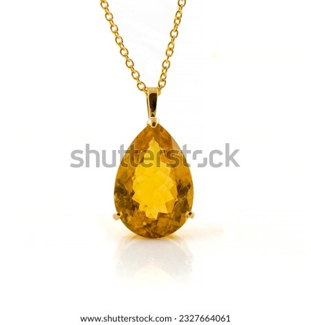 Madeira Citrine Necklace from Yellow Gold. Yellow Gold Necklace with Natural Gemstone. Yellow Gemstone Citrine.  Royalty-Free Stock Photo #2327664061