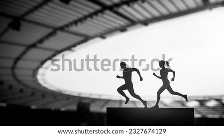 Shared Passion: Silhouettes of Male and Female Runners Create a Mesmerizing Display of Teamwork at a Modern Sports Stadium. Black and White photo, edit space for your montage