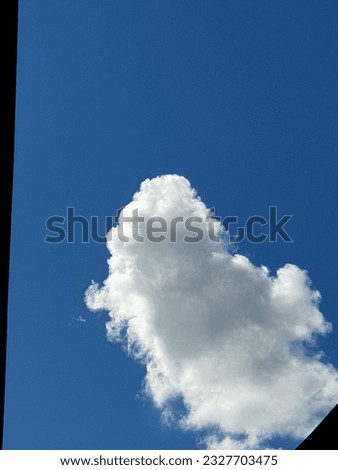 white clouds and blue sky and sunlight in the evening