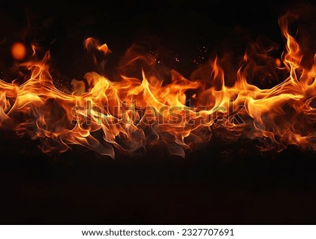 Fire embers particles over black background. Fire sparks background. Abstract dark glitter fire particles lights.  Royalty-Free Stock Photo #2327707691