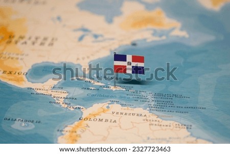 The Flag of Dominican Republic on the World Map. Royalty-Free Stock Photo #2327723463