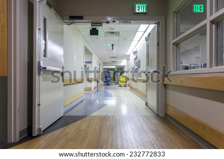 A corridor in a nice, modern hospital.