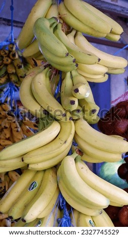 Fresh banana and healthy fruits full of nutrition. Photo taken at the fruit market. Suitable for wallpaper, background, and etc.