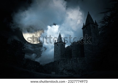 Mysterious medieval castle in a full moon night Royalty-Free Stock Photo #2327774973