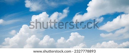 Panoramic photo of clouds in a beautiful clear blue sky