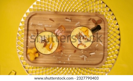 Mango dessert or mango shake or mango delight with jelly served with mango slice