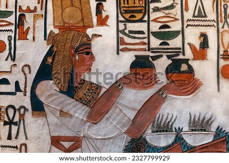 A relief shows queen Nefertari . Valley of Queens .Luxor .Egypt. Royalty-Free Stock Photo #2327799929