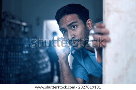 Security, police and man with flashlight for investigation, inspection and property search on night shift. Surveillance, law and male person in dark room for safety, crime and protection service Royalty-Free Stock Photo #2327819131