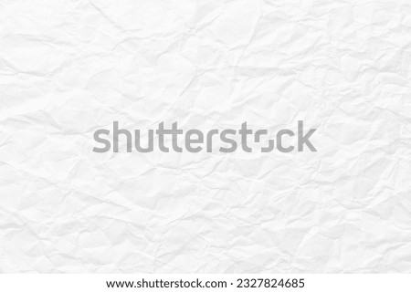 crumpled paper texture to insert text or picture, white sheet background Royalty-Free Stock Photo #2327824685