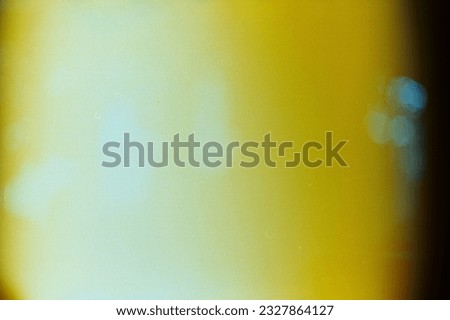yellow and black light streak of burnt film roll