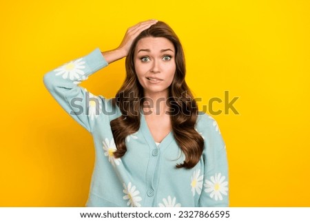 Photo of young funny clueless nervous lady wear turquoise cardigan hand head problems hesitate forgot wallet isolated on yellow color background Royalty-Free Stock Photo #2327866595