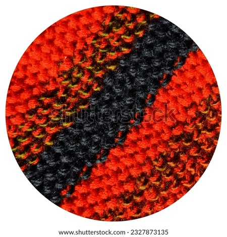 Pattern fabric made of wool. Handmade knitted fabric red and navy blue wool background texture