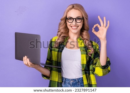 Photo of young business lady wear eyeglasses showing okey symbol use netbook good deal offer done isolated on violet color background