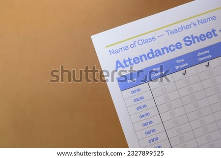 Close up view of student attendance sheet. An attendance sheet is a document used to record the presence or absence of individuals. Royalty-Free Stock Photo #2327899525