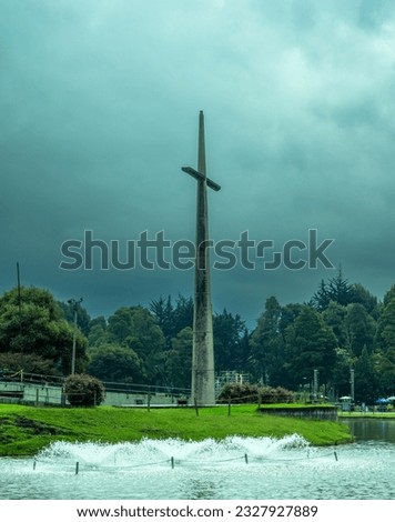Huge cement cross of the Eucharistic temple in the Parque Metropolitano Simón Bolívar (English : Simon Bolivar Metropolitan Park), Bogota, Bogotá, Colombia.