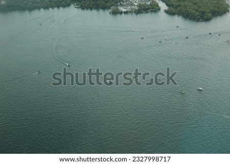 Boats sailing as seen from the top of the CN Tower, Toronto, Canada